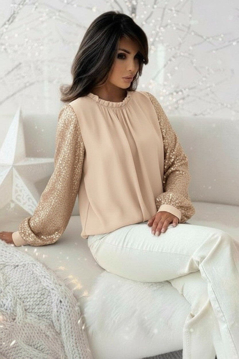 Bluse med pailletærmer